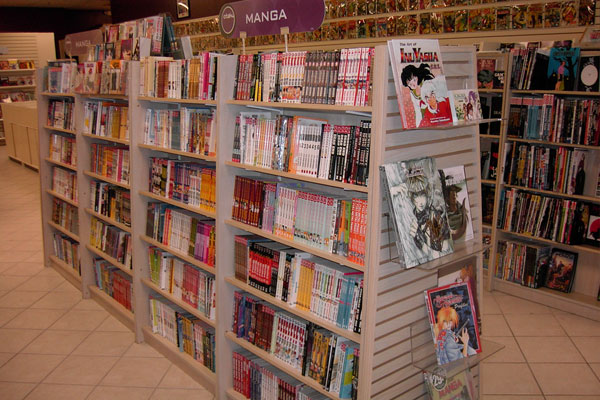 Even more of our book shelves filled with Manga